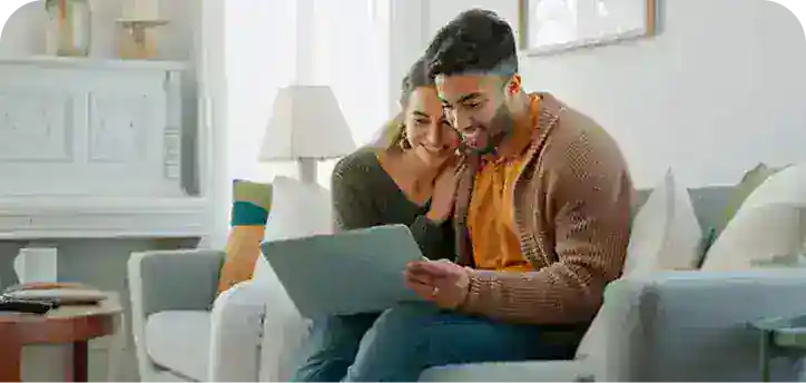 Couple working on laptop