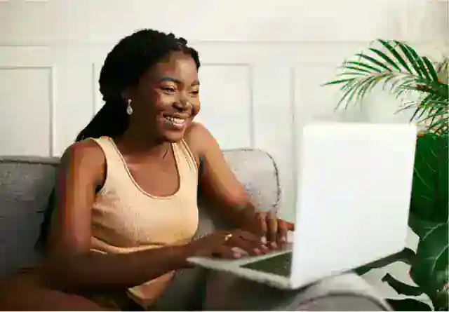 An image of a lady using her laptop.