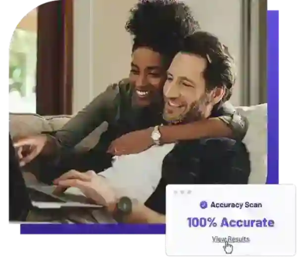 Couple on couch with laptop